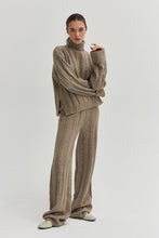 Load image into Gallery viewer, The Dune Sweater feels like a big hug!&nbsp; The gorgeous sand color is the perfect neutral staple, you&#39;ll reach for it over and over again. Pair it with our matching Dune Knit Pants to make it a set!

Soft ribbed knit fabric
Turtleneck
Drop shoulders
Long sleeves
Micro rib details at sleeve cuff and hem
Side Slits
Relaxed Fit
Wash cold with like colors
Model is 5&#39;7&quot; and wearing a Small
Pair it with our Dune Knit Pants to make it a set!