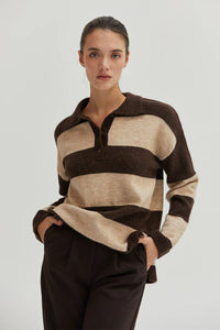 Chocolate brown and tan knit fabric
Collared neckline
Button placket
Striped pattern
Long sleeves
Ribbed cuffs and hem