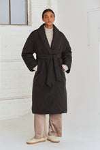 Load image into Gallery viewer, A duvet-like wrap coat with an oversized silhouette, our Lex Duvet Puff Coat is all about luxurious, cozy comfort. This coat also has a folded front collar, self-waist belt, and hidden side pockets. Throw our duvet wrap coat over any outfit to immediately enhance its coziness and comfort.

Folded front lapel collar
Hidden front snap button closure
Detachable self belt with loops
Invisible side pockets
Long line silhouette
Oversized fit
Hand wash