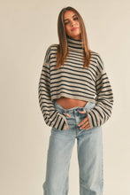 Load image into Gallery viewer, Striped knit fabric
Turtleneck
Dropped shoulders
Long sleeves
Cropped length
Striped turtleneck cropped sweater
Ribbed detailing at hem and sleeve cuff